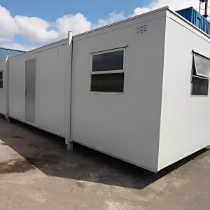 Oficina portátil de planta abierta de 32 × 10 pies — revestido en acero caseta, repintado a pedido, vista exterior